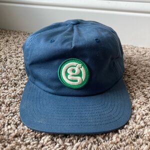 Blue Baseball Cap with Green Logo